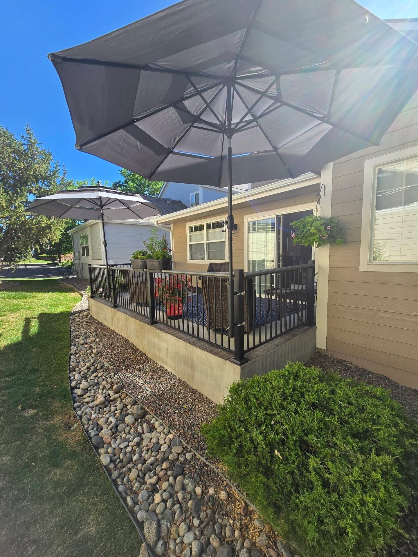 Backyard Patio Deck with Umbrellas — Yardage Outdoor Living