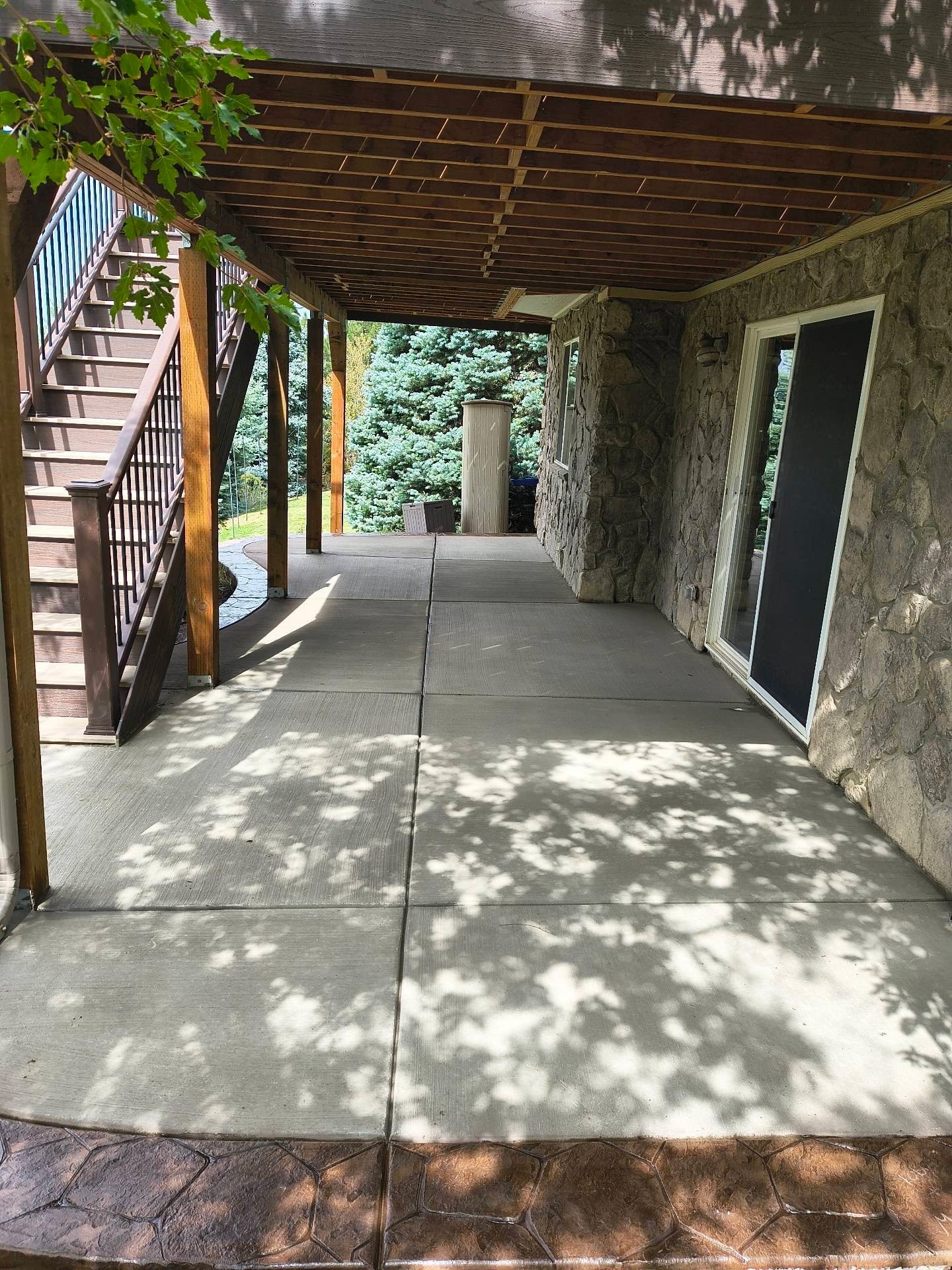 Covered Patio with Stone Walls and Stairs — Yardage Outdoor Living